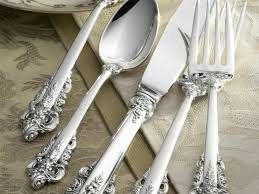 Ornate sterling silver flatware set